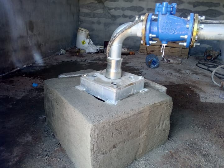 Backfilling over an installed pipe